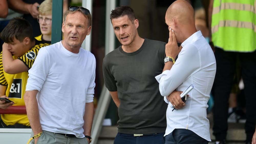BVB players: managing directors Hans-Joachim Watzke and Carsten Cramer (right) with sporting director Sebastian Kehl (centre).