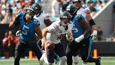 Chicago Bears quarterback Caleb Williams (18) scrambles out of the pocket during the second quarter against the Carolina Panthers at Bank of America Stadium in Charlotte, N.C., on September 13, 2026. Williams broke free for a rushing touchdown on the play as the Bears faced the Panthers in National Football League (NFL) regular-season action. (Photo by John J. Kim/Chicago Tribune/TNS/Sipa USA)
