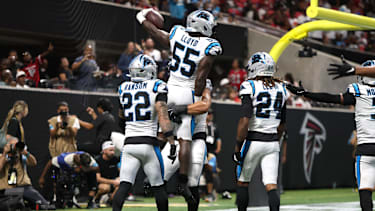 Sep 20, 2026; Atlanta, Georgia, USA;  Carolina Panthers linebacker Devin Lloyd (55) celebrates with teammates after scoring a touchdown on an interception during the third quarter against the Atlanta Falcons at Mercedes-Benz Stadium.  Mandatory Credit: Brett Davis-Imagn Images