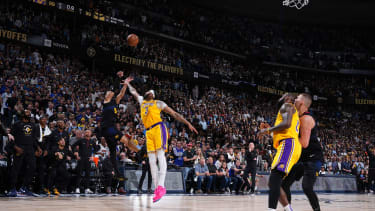 DENVER, CO - APRRIL 22: Jamal Murray #27 of the Denver Nuggets scores the game winning basket during the game against the Los Angeles Lakers during Round 1 Game 2 of the 2024 NBA Playoffs on April 22, 2024 at the Ball Arena in Denver, Colorado. NOTE TO USER: User expressly acknowledges and agrees that, by downloading and/or using this Photograph, user is consenting to the terms and conditions of the Getty Images License Agreement. Mandatory Copyright Notice: Copyright 2024 NBAE (Photo by Garrett Ellwood/NBAE via Getty Images)