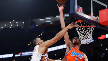 Dec 10, 2025; Oklahoma City, Oklahoma, USA; Oklahoma City Thunder center Chet Holmgren (7) blocks a shot by Phoenix Suns forward Dillon Brooks (3) during the second quarter at Paycom Center. Mandatory Credit: Alonzo Adams-Imagn Images