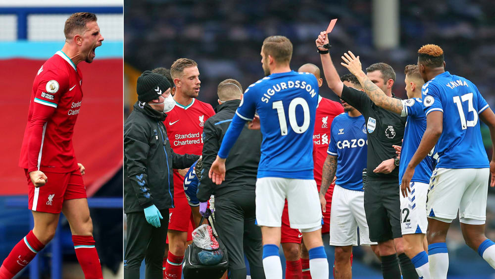 Jordan Henderson und Schiedsrichter Michael Oliver