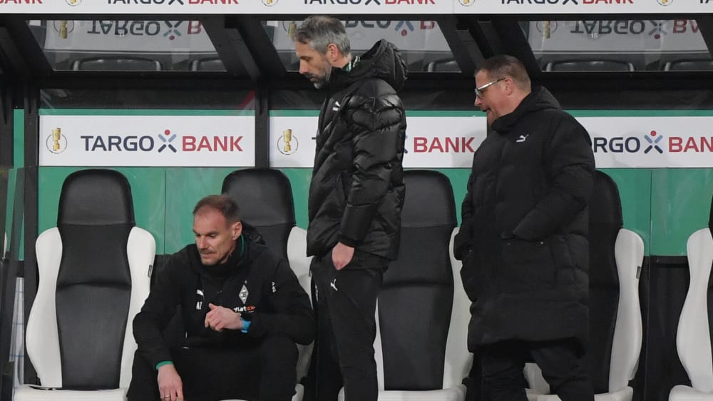 Gladbacher Trauer nach dem Pokal-Aus: Alexander Zickler, Marco Rose und Max Eberl (v. l.).