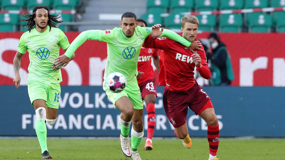 Rein in die Zweikämpfe: Kölns Sebastian Andersson (r.) im Duell mit Wolfsburg Maxence Lacroix.