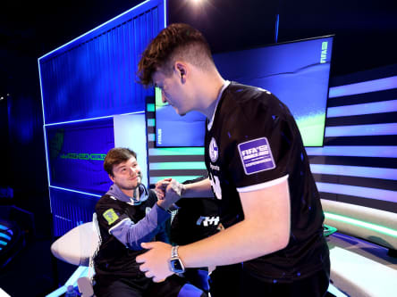 COPENHAGEN, DENMARK - JULY 22: Hasan Eker (Hasoo19) of FC Schalke 04 and Julius Kühle (Juli) of FC Schalke 04 celebrates during the knockout match between FC Schalke 04 and NEO as part of the FIFAe Club World Cup 2022 on July 22, 2022 in Copenhagen, Denmark. (Photo by Gonzalo Arroyo - FIFA/FIFA via Getty Images)