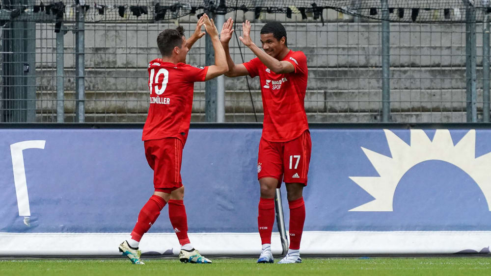 Schlag ein: Welzmüller und Tillman (r.) beim Torjubel.