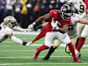 Oct 5, 2026; New Orleans, Louisiana, USA;  Atlanta Falcons running back Bijan Robinson (7) runs against New Orleans Saints safety Jonas Sanker (7) during the first half at Caesars Superdome.  Mandatory Credit: Stephen Lew-Imagn Images