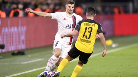 In der Champions League noch Gegner, bald Teamkollegen: Thomas Meunier und Raphael Guerreiro.