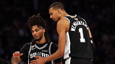Jun 8, 2026; New York, New York, USA; San Antonio Spurs guard Stephon Castle (5) talks with forward Victor Wembanyama (1) against the New York Knicks during game three of the 2026 NBA Finals in the third quarter at Madison Square Garden. Mandatory Credit: Geoff Burke-Imagn Images