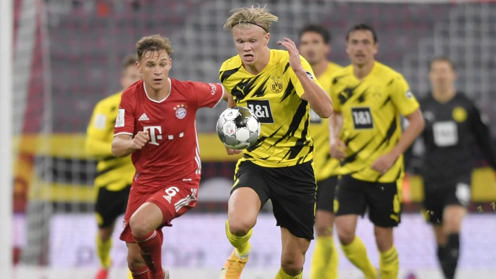 Bayern und Dortmund treffen sich am Samstag bereits zum dritten Mal in dieser Saison - hier Joshua Kimmich (l.) im Duell mit Erling Haaland.