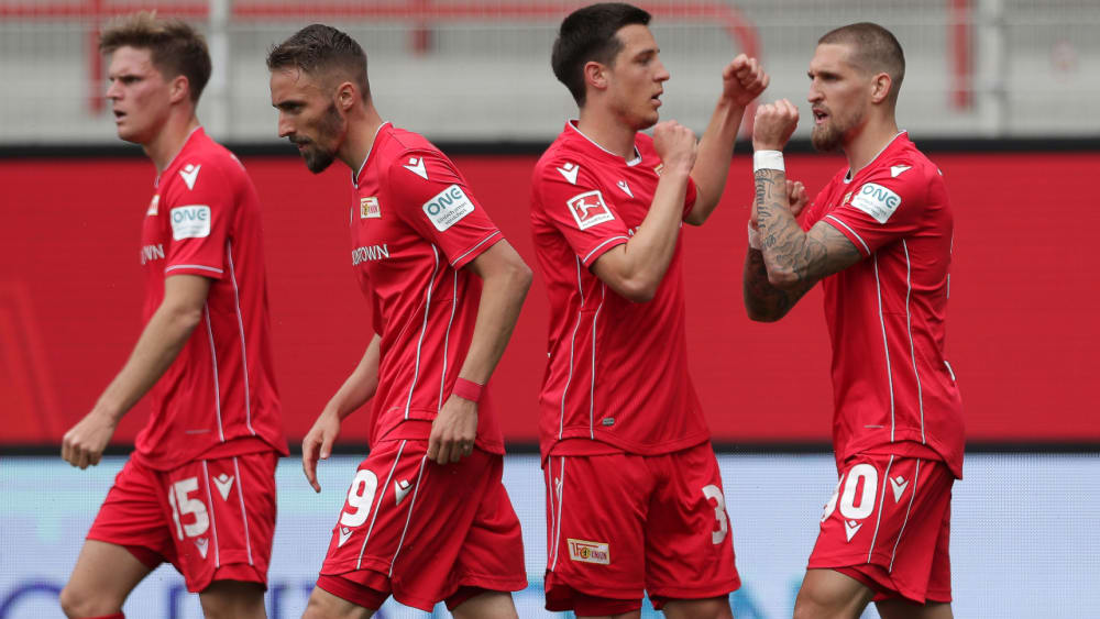 Schlag ein: Unions Robert Andrich (r.) jubelt mit Keven Schlotterbeck.