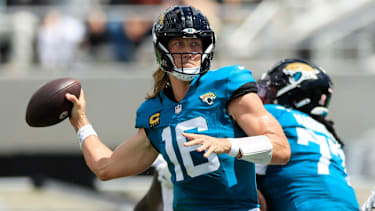 Jacksonville Jaguars quarterback Trevor Lawrence (16) throws a touchdown pass to wide receiver Parker Washington (11), not shown, during the first quarter of an NFL football matchup at EverBank Stadium on Sunday, Sept. 13, 2026, in Jacksonville, Fla. [Corey Perrine/Florida Times-Union]