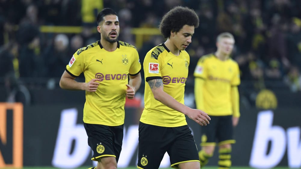 Gegen Schalke nicht mit dabei: Emre Can und Axel Witsel.