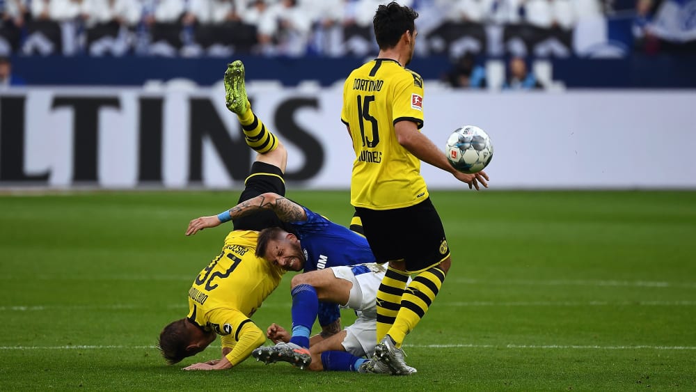 Großer Kampf: Lukasz Piszczek (v.l.), Guido Burgstaller und Mats Hummels ringen um den Ball.