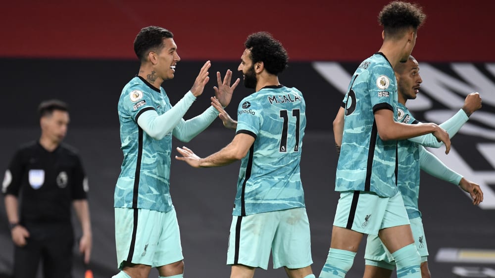 Entschieden die Partie zu Gunsten der Reds: Roberto Firmino (li.) und Mo Salah.