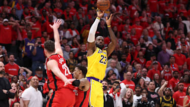 Apr 24, 2026; Houston, Texas, USA; Los Angeles Lakers forward LeBron James (23) scores a three-point basket late in the fourth quarter against the Houston Rockets during game three of the first round of the 2026 NBA Playoffs at Toyota Center. Mandatory Credit: Troy Taormina-Imagn Images