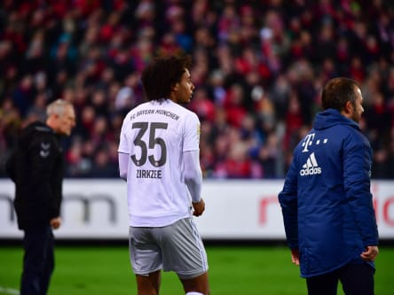 Christian Streich (li.), Joshua Zirkzee, Hansi Flick