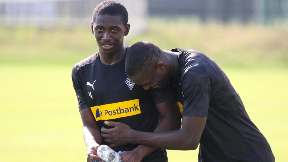 Kann wieder lachen: Mamadou Doucouré (li.), hier mit Neuzugang Marcus Thuram.
