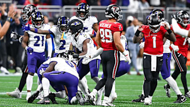 ATLANTA, GA - OCTOBER 11: Baltimore players celebrate an interception in overtime as Atlanta quarterback Tua Tagovailoa (1) reacts during the NFL, American Football Herren, USA game between the Baltimore Ravens and the Atlanta Falcons on October 11th, 2026 at Mercedes-Benz Stadium in Atlanta, GA. (Photo by Rich von Biberstein Icon Sportswire) NFL: OCT 11 Ravens at Falcons EDITORIAL USE ONLY Icon261011035