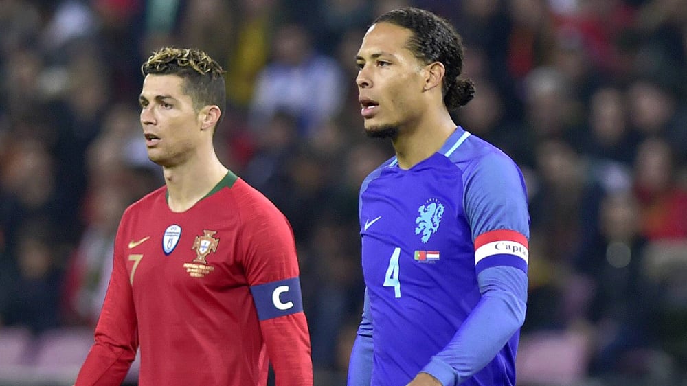 Cristiano Ronaldo (li.) und Virgil van Dijk