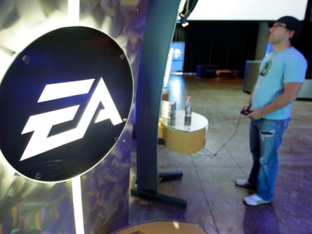 An attendee tries out a Electronic Arts Inc. video game during the annual Studio Showcase media event at the company's headquarters in Redwood City, California, U.S., on Tuesday, July 20, 2010. Electronic Arts, the world's second-biggest video-game publisher, is in the middle of a market shift, moving away from its declining console business, which accounts for almost to-thirds of annual sales, and toward games that are played online. Photographer: Tony Avelar/Bloomberg via Getty Images