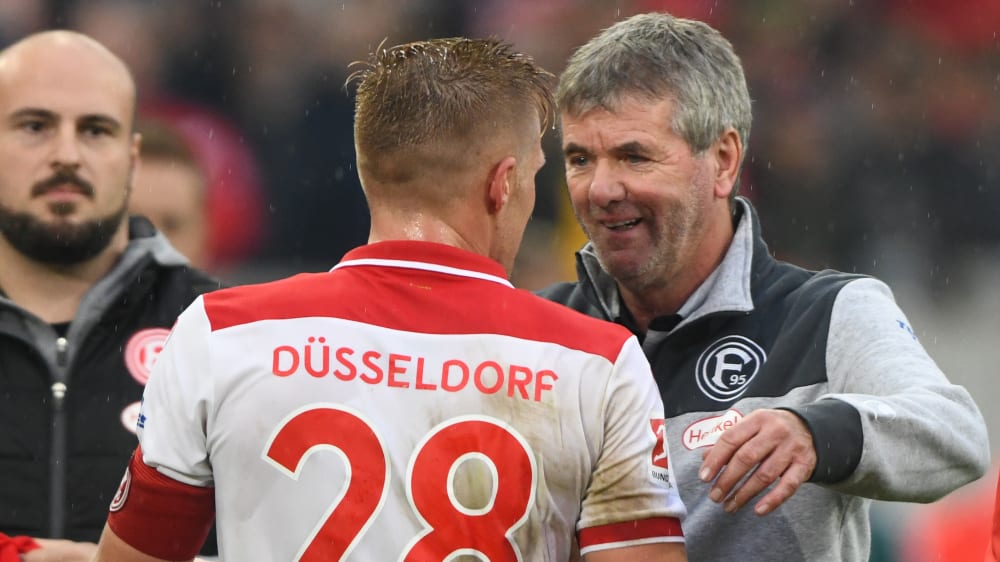 Bescherte seinem Coach Friedhelm Funkel (rechts) den ersten Erfolg gegen Mainz 05: Rouwen Hennings.