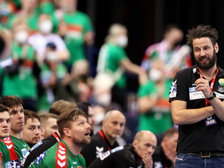 HAMBURG, GERMANY - APRIL 24: Bennet Wiegert, head coach of SC Magdeburg reacts during the REWE Final 4 final match between THW Kiel and SC Magdeburg at Barclays Arena on April 24, 2022 in Hamburg, Germany. (Photo by Martin Rose/Getty Images)