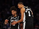 Jun 8, 2026; New York, New York, USA; San Antonio Spurs guard Stephon Castle (5) talks with forward Victor Wembanyama (1) against the New York Knicks during game three of the 2026 NBA Finals in the third quarter at Madison Square Garden. Mandatory Credit: Geoff Burke-Imagn Images