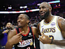 Dec 7, 2025; Philadelphia, Pennsylvania, USA; Los Angeles Lakers forward Lebron James (23) and Philadelphia 76ers guard Tyrese Maxey react with each other after the game at Xfinity Mobile Arena. Mandatory Credit: Bill Streicher-Imagn Images