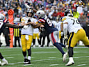 Sep 20, 2026; Foxborough, Massachusetts, USA;  Pittsburgh Steelers quarterback Aaron Rodgers (8) is hit by New England Patriots linebacker Elijah Ponder (91) in the first half at Gillette Stadium.  Mandatory Credit: Eric Canha-Imagn Images