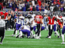 ATLANTA, GA - OCTOBER 11: Baltimore players celebrate an interception in overtime as Atlanta quarterback Tua Tagovailoa (1) reacts during the NFL, American Football Herren, USA game between the Baltimore Ravens and the Atlanta Falcons on October 11th, 2026 at Mercedes-Benz Stadium in Atlanta, GA. (Photo by Rich von Biberstein Icon Sportswire) NFL: OCT 11 Ravens at Falcons EDITORIAL USE ONLY Icon261011035