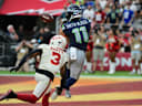Sep 20, 2026; Glendale, Arizona, USA;  Seattle Seahawks wide receiver Jaxon Smith-Njigba (11) catches the ball for a touchdown in the fourth quarter against the Arizona Cardinals at State Farm Stadium.  Mandatory Credit: Matt Kartozian-Imagn Images