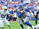 Sep 27, 2026; Orchard Park, New York, USA;  Buffalo Bills quarterback Josh Allen (17) carries the ball in the second half against the Los Angeles Chargers at New Highmark Stadium.  Mandatory Credit: Mark Konezny-Imagn Images