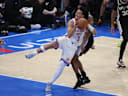 May 26, 2026; Oklahoma City, Oklahoma, USA; Oklahoma City Thunder guard Jared McCain (3) is fouled by San Antonio Spurs guard De'aaron Fox (4) during the third quarter in game five of the western conference finals for the 2026 NBA playoffs at Paycom Center. Mandatory Credit: Brett Rojo-Imagn Images