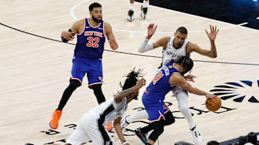 SAN ANTONIO, TEXAS - JUNE 05: Jalen Brunson #11 of the New York Knicks dribbles against Victor Wembanyama #1 of the San Antonio Spurs during the fourth quarter in Game Two of the 2026 NBA Finals at Frost Bank Center on June 05, 2026 in San Antonio, Texas. NOTE TO USER: User expressly acknowledges and agrees that, by downloading and or using this photograph, User is consenting to the terms and conditions of the Getty Images License Agreement. (Photo by Ronald Cortes/Getty Images)