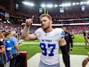 Oct 11, 2026; Glendale, Arizona, USA; Detroit Lions defensive end Aidan Hutchinson (97) celebrates as he walks off the field after defeating the Arizona Cardinals at State Farm Stadium. Mandatory Credit: Mark J. Rebilas-Imagn Images