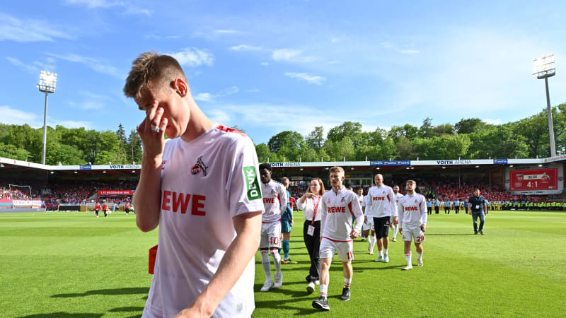 HEIDENHEIM, GERMANY - MAY 18: Steffen Tigges, Faride Alidou, Florian Kainz and Jan Thielmann of 1. FC Köln look dejected after the team's defeat and relegation from the Bundesliga during the Bundesliga match between 1. FC Heidenheim 1846 and 1. FC Köln at Voith-Arena on May 18, 2024 in Heidenheim, Germany. (Photo by Sebastian Widmann/Getty Images)