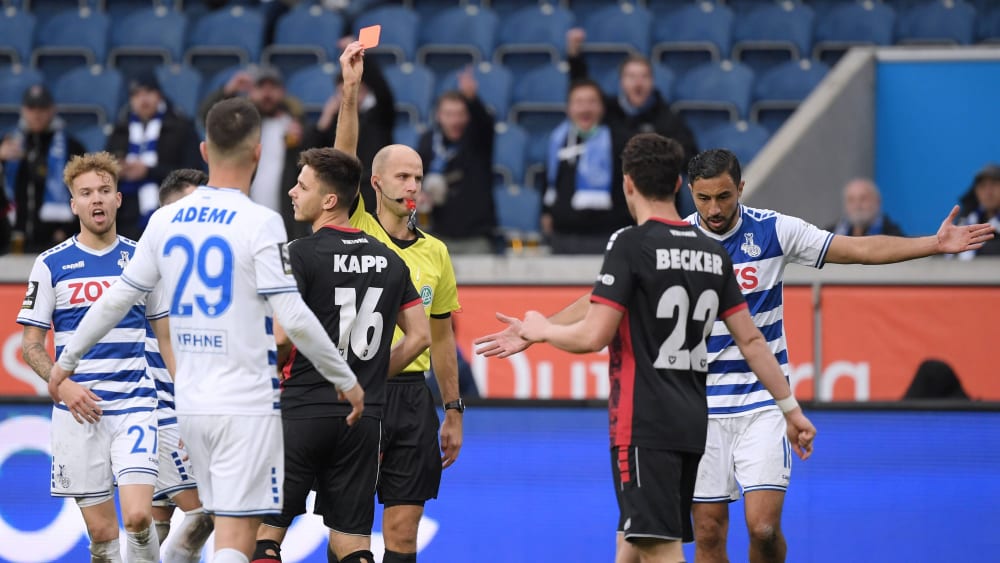 Red card: Berlin's Patrick Kapp is sent off the field.