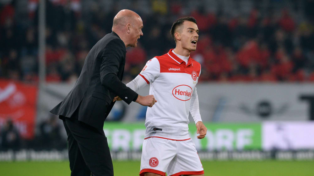 Düsseldorfs Erik Thommy (re.) hat Trainer Uwe Rösler soll überzeugt.