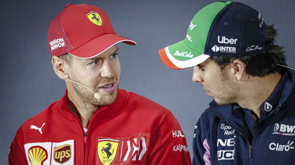 Sergio Perez (re.) ist Sebastian Vettel nicht böse.