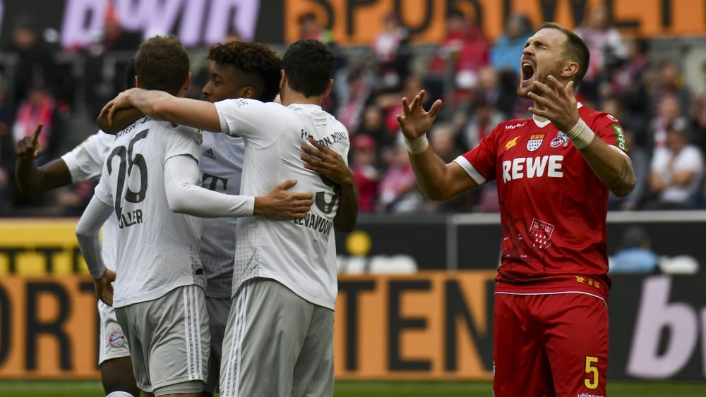 Desolater Start: Die Bayern jubeln, während Kölns Rafael Czichos (r.) seinen Frust herausschreit.