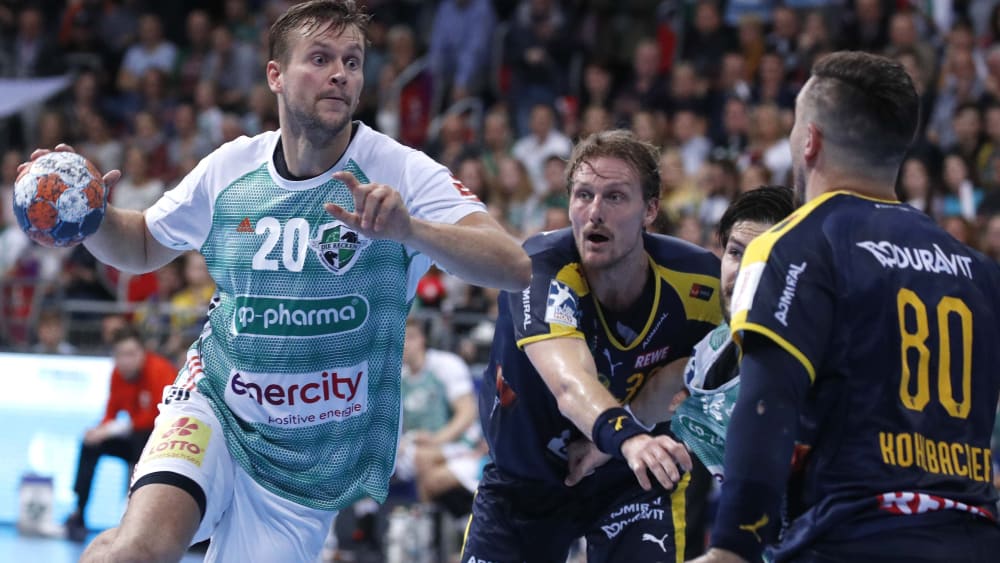 Hannovers Fabian Böhm (li.) gegen Jesper Nielsen.