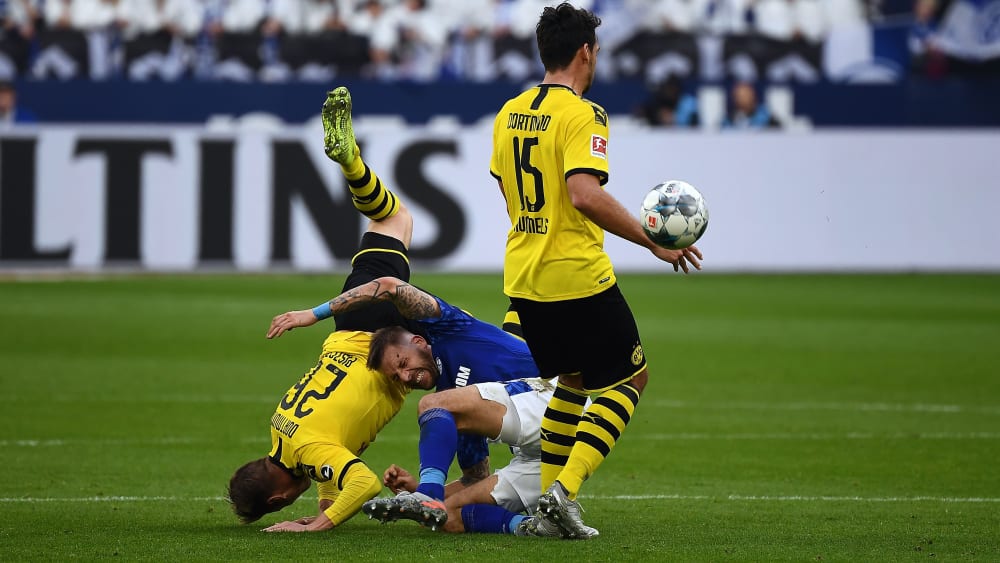 Großer Kampf: Lukasz Piszczek (v.l.), Guido Burgstaller und Mats Hummels ringen um den Ball.
